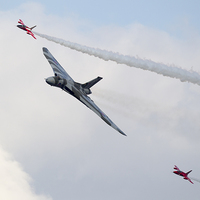 Buy canvas prints of Vulcan and Gnats at Duxford by Keith Campbell
