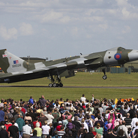 Buy canvas prints of  Vulcan XH558 and crowd by Keith Campbell