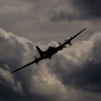 Buy canvas prints of  B-17 in the clouds by Keith Campbell