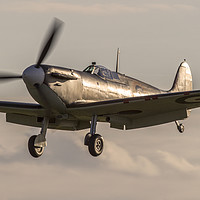 Buy canvas prints of Sunset Spitfire landing by Keith Campbell