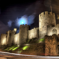 Buy canvas prints of  Conwy Castle At Night by David Bretnall