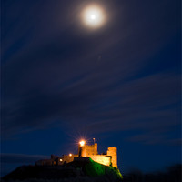 Buy canvas prints of Bamburgh Castle Northumberland by Brian Dingle
