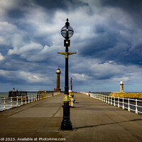 Buy canvas prints of Whitby Lamps, piers, and Sunshine by Cass Castagnoli