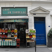 Buy canvas prints of Oldfashioned retail store in Paris by Jutta Klassen