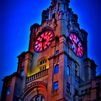 Buy canvas prints of Liverpool Liver Building At Dusk by Sandra Buchanan