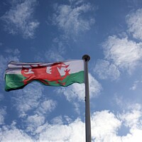 Buy canvas prints of Red Dragon Welsh Flag Fluttering in the Breeze by HELEN PARKER