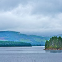 Buy canvas prints of Capmpbell Lake in the Rain by David Davies