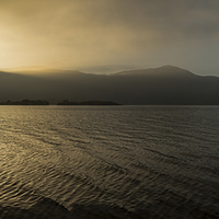 Buy canvas prints of The sun sets over a misty Derwentwater by Dave Hudspeth Landscape Photography