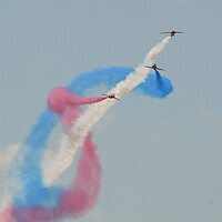 Buy canvas prints of Red Arrows Paint the Sky by Jon Fixter