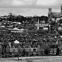 Buy canvas prints of Lincoln cathedral with  city Rooftops & Spires by Jon Fixter