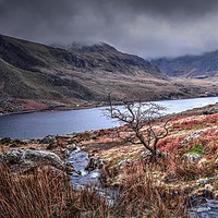 Buy canvas prints of The Mist Rolls In around Tryfan Snowdonia Mountain by Jon Fixter