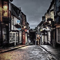Buy canvas prints of Evening Light on wet cobbles  by Jon Fixter