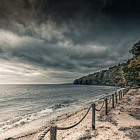 Buy canvas prints of Dark Skies over the beach by Ian Johnston  LRPS