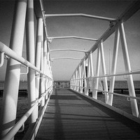 Buy canvas prints of Walkway to the moorings by Ian Johnston  LRPS