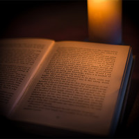 Buy canvas prints of Reading by Candlelight by Ian Johnston  LRPS