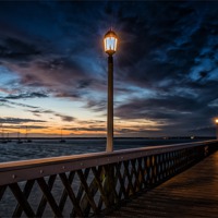 Buy canvas prints of Night-Time at the Pier by Ian Johnston  LRPS