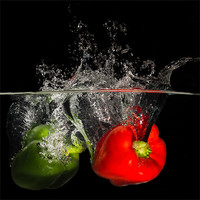 Buy canvas prints of Red and Green Peppers by Stuart Gillespie