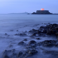 Buy canvas prints of Misty Evening in Guernsey by Rob Smith