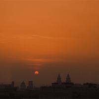 Buy canvas prints of Liverpool Skyline Orange Sun Set by Phillip Orr