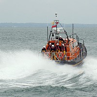 Buy canvas prints of Lifeboat to the rescue. by Mike Streeter