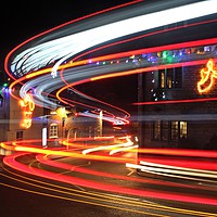 Buy canvas prints of Christmas light trails by Mike Streeter