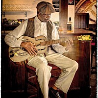 Buy canvas prints of The Man Plays The Blues by Marie Castagnoli