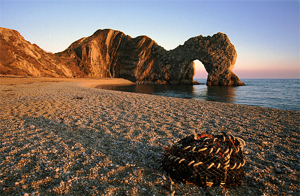 Durdle Door at dusk. Picture Board by Ian Duffield