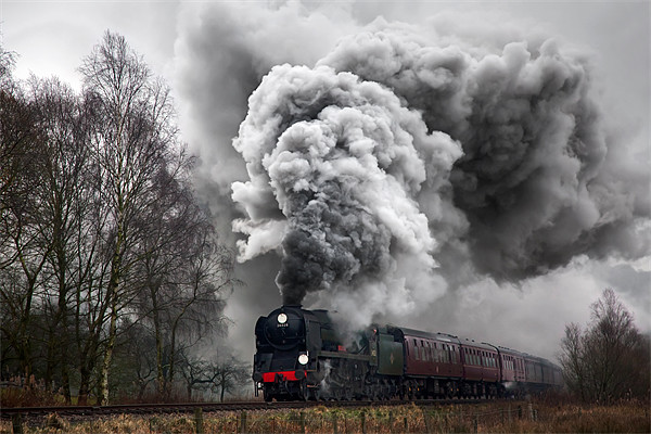 A historic steam locomotive produces volcanic exha Picture Board by Ian Duffield