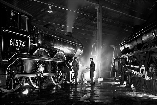 Steam loco crew stop for a chat at night. Picture Board by Ian Duffield