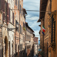 Buy canvas prints of Quaint old Tuscan street by Ian Duffield