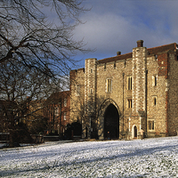 Buy canvas prints of  St Albans Abbey Gateway in the snow by Ian Duffield
