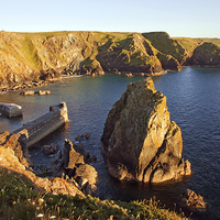 Buy canvas prints of  Early evening at Mullion Cove by Ian Duffield