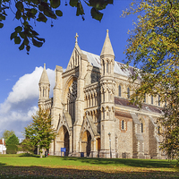 Buy canvas prints of  St Albans Abbey amongst autumnal trees by Ian Duffield