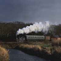 Buy canvas prints of  Steam train in stormy conditions. by Ian Duffield