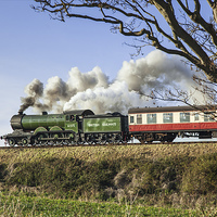 Buy canvas prints of  1950's steam train on an embankment by Ian Duffield