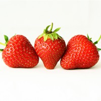 Buy canvas prints of Three Strawberries On White by Alan Harman