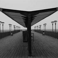 Buy canvas prints of peering the pier by angela Mackenzie-Brown