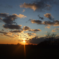 Buy canvas prints of December Sunset by Ursula Keene