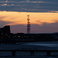 Buy canvas prints of Telecommunication Tower Sunset by Ursula Keene