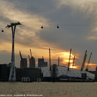 Buy canvas prints of Sun setting over O2 & Cable Cars seen from deck of TS Wylde Swan by Ursula Keene