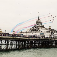 Buy canvas prints of Red Arrows Eastbourne Pier by Robert  Radford