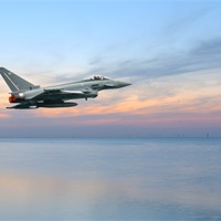 Buy canvas prints of Eurofighter Typhoon Sunset by Robert  Radford