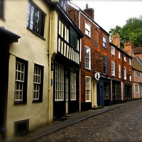 Buy canvas prints of  Cobbled St, Norwich by Gordon Holmes