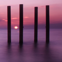 Buy canvas prints of west pier sunset pillars by Terry Busby