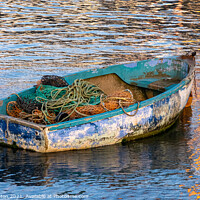 Buy canvas prints of Enduring Beauty of a weather-worn boat by Roger Dutton