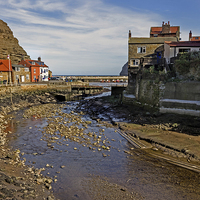 Buy canvas prints of To The Harbour Mouth Staithes by keith sayer
