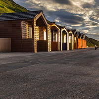 Buy canvas prints of Saltburn beach huts at sunset by keith sayer