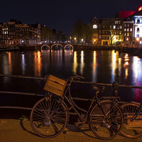 Buy canvas prints of  Night Lights on the Amsterdam Canals. Holland  by Jenny Rainbow