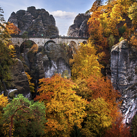 Buy canvas prints of  Bastei Bridge in Autumn Time. Saxon Switzerland by Jenny Rainbow