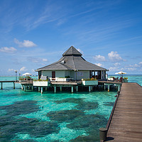 Buy canvas prints of Overwater Restaurant at Maldivian Resort by Jenny Rainbow